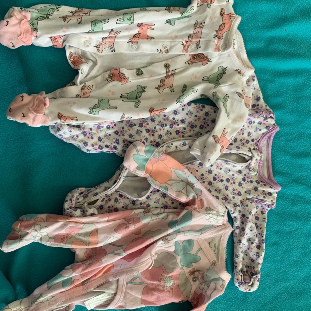 Three newborn girls sleepers. CARTERS